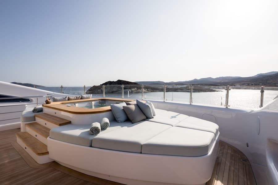 upper deck sun beds, luxury lifestyle, mega yacht charter Greece