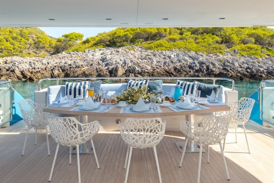 luxury out door dining, luxury superyacht dining, superyacht charter Greece