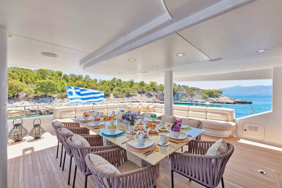 luxury dining, outdoor dining, superyacht charter Prometheus Greece