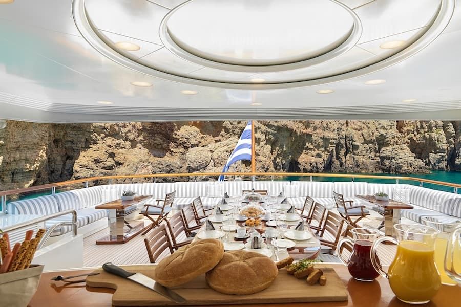 luxury deck, superyacht rental Greece, luxury dining Greece